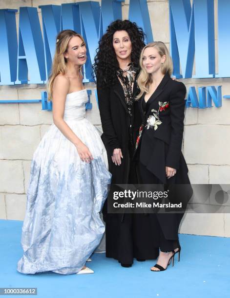 Lily James, Cher and Amanda Seyfried attend the UK Premiere of "Mamma Mia! Here We Go Again" at Eventim Apollo on July 16, 2018 in London, England.