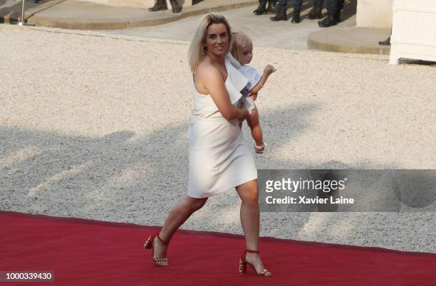 Wife of Antoine Griezmann, Erika Choperena arrive as receives France's national football team at Elysee Palace on July 16, 2018 in Paris, France....