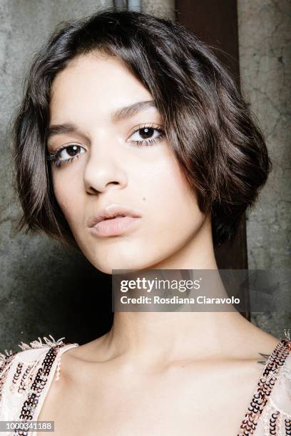 Model is seen backstage ahead of the Aniye By Fashion Show SS19 on July 16, 2018 in Milan, Italy.