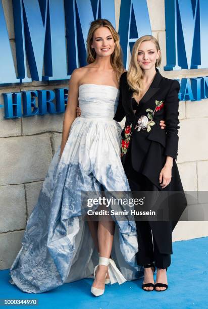 Lily James and Amanda Seyfried attend the UK Premiere of "Mamma Mia! Here We Go Again" at Eventim Apollo on July 16, 2018 in London, England.