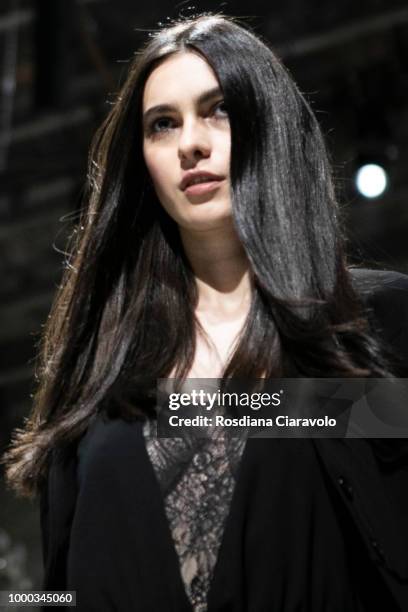 Model is, runway hair detail, seen backstage ahead of the Aniye By Fashion Show SS19 on July 16, 2018 in Milan, Italy.