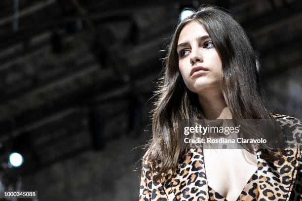 Model is, runway hair detail, seen backstage ahead of the Aniye By Fashion Show SS19 on July 16, 2018 in Milan, Italy.