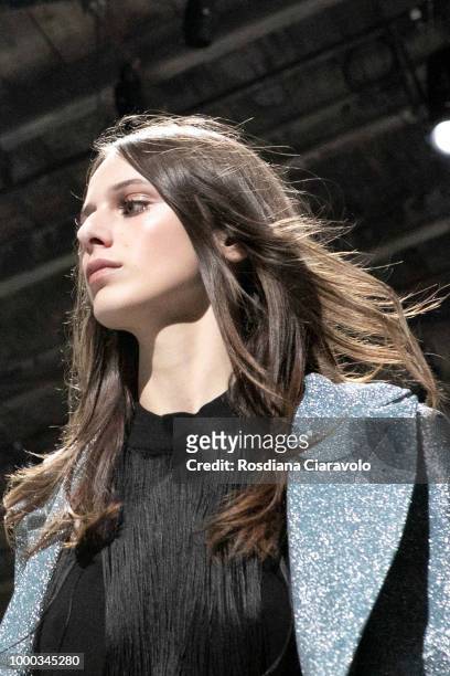 Model is, runway hair detail, seen backstage ahead of the Aniye By Fashion Show SS19 on July 16, 2018 in Milan, Italy.