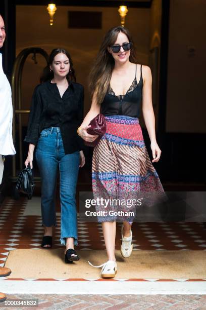 Stella Banderas and Dakota Johnson are seen in Tribeca on July 16, 2018 in New York City.