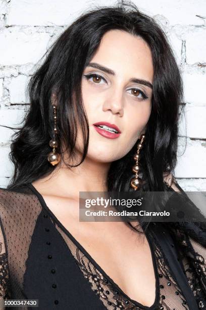 Catherine Poulain is seen backstage ahead of the Aniye By Fashion Show SS19 on July 16, 2018 in Milan, Italy.