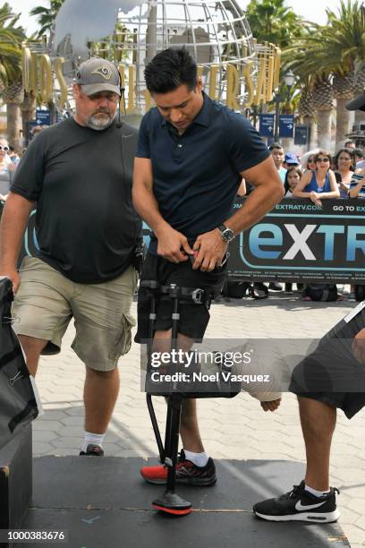 Mario Lopez arrives at "Extra" at Universal Studios Hollywood on July 16, 2018 in Universal City, California. Lopez returns to set after injuring his...