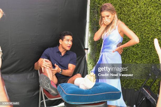 Mario Lopez and Renee Bargh arrive at "Extra" at Universal Studios Hollywood on July 16, 2018 in Universal City, California. Lopez returns to set...