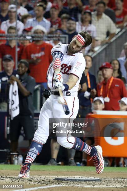 Bryce Harper of the Washington Nationals and National League competes in the first round during the T-Mobile Home Run Derby at Nationals Park on July...