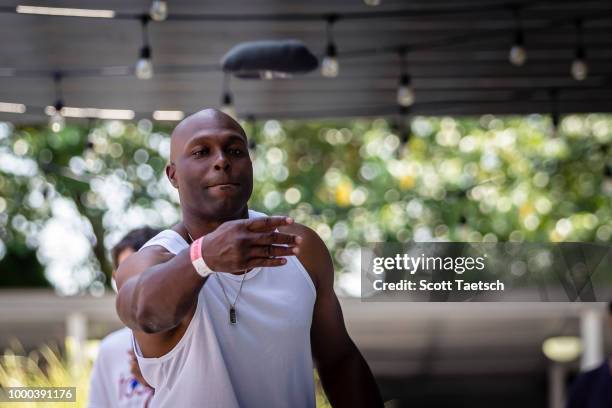 Torii Hunter plays cornhole at the Oakley Pool Party Featuring Deep Eddy Vodka at Capitol Skyline Hotel Pool on July 16, 2018 in Washington, DC.