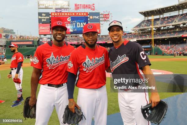 Lorenzo Cain and Jeremy Jeffress of the Milwaukee Brewers and Michael Brantley of the Cleveland Indians pose for a photo prior to the T-Mobile Home...