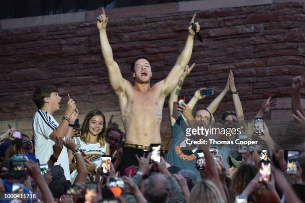 Dan Reynolds of Imagine Dragons performs in a sold out crowd during their Evolve World Tour stop at Red Rocks Amphitheatre on July 16, 2018 in...