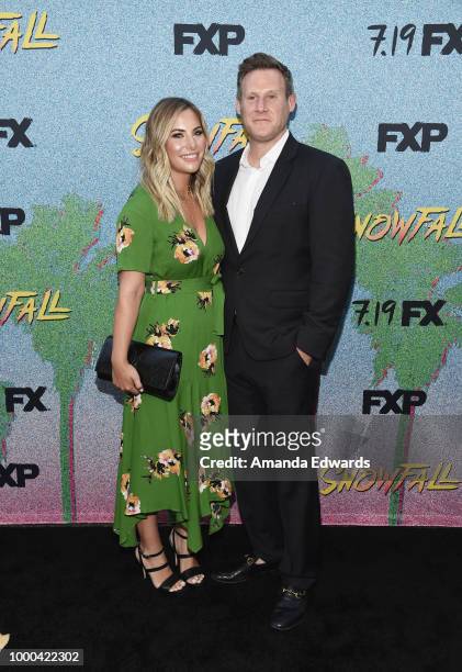 Producer Trevor Engelson and Tracey Kurland arrive at the premiere of FX's "Snowfall" Season 2 at the Regal Cinemas L.A. LIVE Stadium 14 on July 16,...