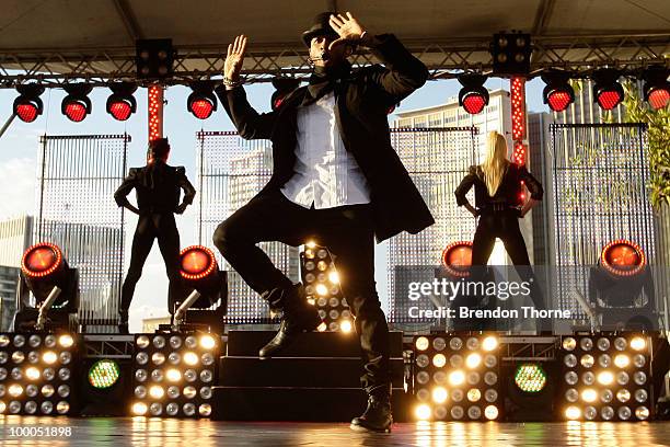 Singer Usher performs during the "Sunrise" broadcast at the Overseas Passenger Terminal on May 21, 2010 in Sydney, Australia. Usher is in Australia...