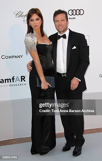 Former German footballer Lothar Matthaus and model Kristina Liliana attends the amfAR Cinema Against AIDS 2010 at the Hotel du Cap during the 63rd...