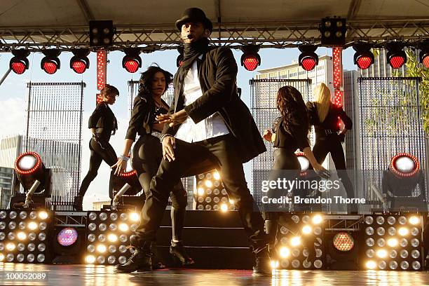 Singer Usher performs during the "Sunrise" broadcast at the Overseas Passenger Terminal on May 21, 2010 in Sydney, Australia. Usher is in Australia...