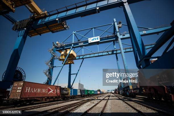 Containers are seen at the train station in the Duisburg port on July 16, 2018 in Duisburg, Germany. Approximately 25 trains a week use the "Silk...