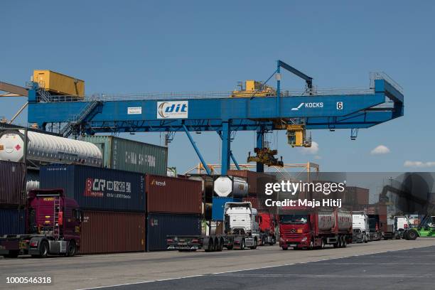 Containers from China are seen at terminals in the Duisburg port on July 16, 2018 in Duisburg, Germany. Approximately 25 trains a week use the "Silk...