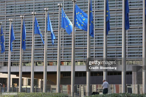 European Union flags fly outside the Berlaymont building, which houses the headquarters of the European Commission, in Brussels, Belgium, on Monday,...