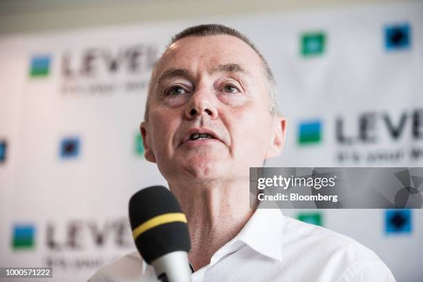 Willie Walsh, chief executive officer of International Consolidated Airlines Group SA , speaks during a news conference to launch the Austrian base...