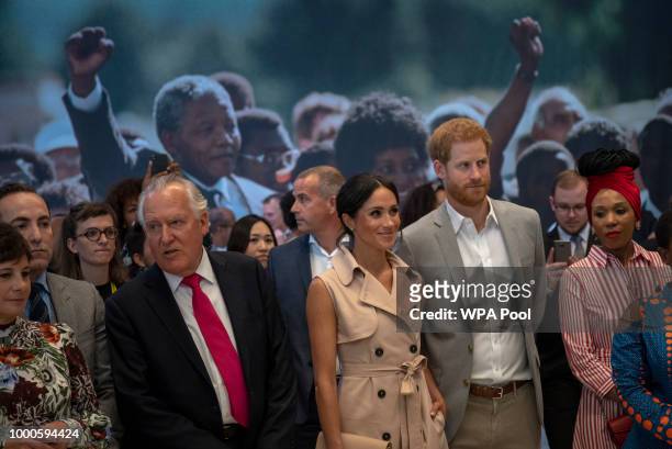 Lord Peter Hain, Chair of The Nelson Mandela Centenary Committee accompanies Prince Harry, Duke of Sussex, Meghan, Duchess of Sussex and Nelson...