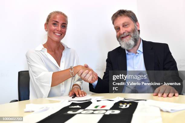 Juventus Women new signing Hilda Petronella Ekroth with Stefano Braghin on July 17, 2018 in Vinovo, Italy.