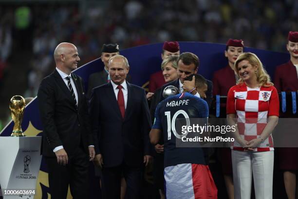 Emmanuel Macron, Kylian Mbappe, Vladimir Putin during Russia 2018 World Cup final football match between France and Croatia at the Luzhniki Stadium...