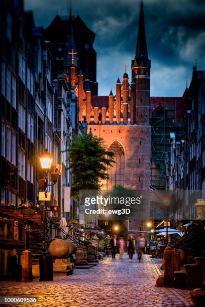 mariacka street in old town by night, gdansk, poland - gdansk stock pictures, royalty-free photos & images