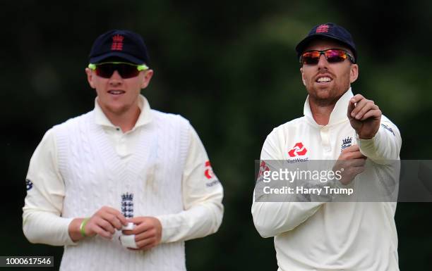 Dom Bess and Jack Leach of England Lions look on during Day Two of the Tour Match match between England Lions and India A at New Road on July 17,...