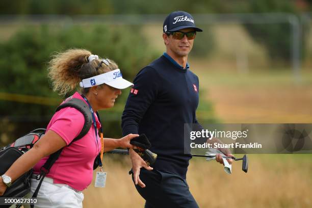 Adam Scott of Australia with his caddie Fanny Sunesson during previews to the 147th Open Championship at Carnoustie Golf Club on July 16, 2018 in...