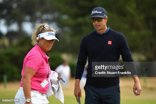 Adam Scott of Australia with his caddie Fanny Sunesson during previews to the 147th Open Championship at Carnoustie Golf Club on July 16, 2018 in...