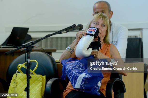 Rita Calore, mother of Stefano Cucchi,shows boxing gloves of Stefano,interviewed as a witness during the trial against five military police officers...