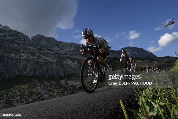 Great Britain's Christopher Froome rides down after the Colombiere pass during the tenth stage of the 105th edition of the Tour de France cycling...