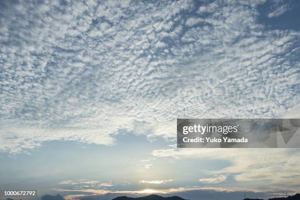 cloud typologies - cirrocumulus cloud - 巻積雲 ストックフォトと画像