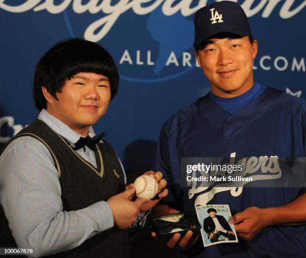 Singer Lin Yu-Chun and Hong-Chih Kuo of the Los Angeles Dodgers attend news conference to announce expanded partnership between the Los Angeles...