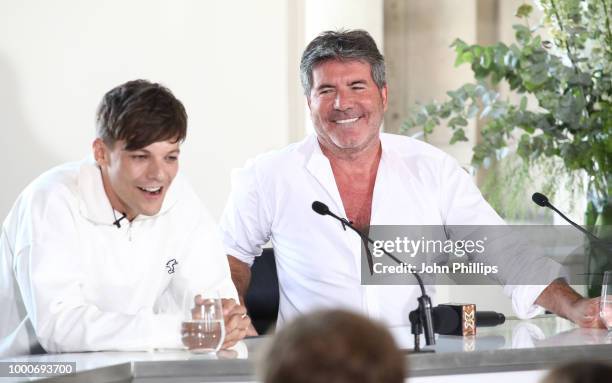 Louis Tomlinson and Simon Cowell laugh during The X Factor 2018 launch at Somerset House on July 17, 2018 in London, England.