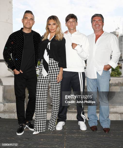 Robbie Williams, Ayda Field, Louis Tomlinson and Simon Cowell pose during The X Factor 2018 launch at Somerset House on July 17, 2018 in London,...