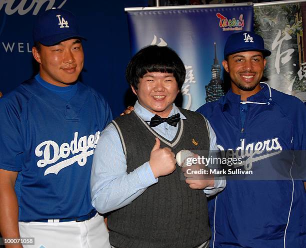 Hong-Chih Kuo and Xavier Paul of the Los Angeles Dodgers and singer Lin Yu-Chun attend a news conference to announce expanded partnership between the...