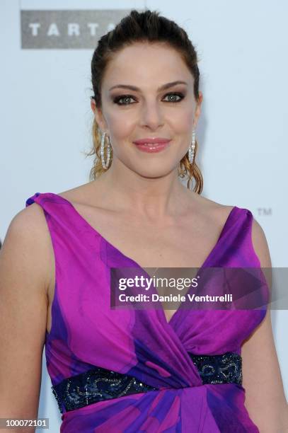 Claudia Gerini arrives at amfAR's Cinema Against AIDS 2010 benefit gala at the Hotel du Cap on May 20, 2010 in Antibes, France.