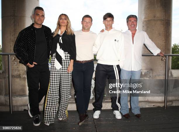 Robbie Williams, Ayda Field, Dermot O'Leary, Louis Tomlinson and Simon Cowell during The X Factor 2018 launch at Somerset House on July 17, 2018 in...