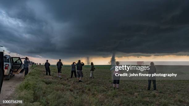 spectaters watch sister tornadoes, colorado. usa - storm chaser stock pictures, royalty-free photos & images