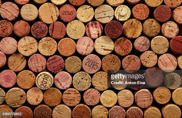 close up background of used wine corks - champagne cork stock pictures, royalty-free photos & images