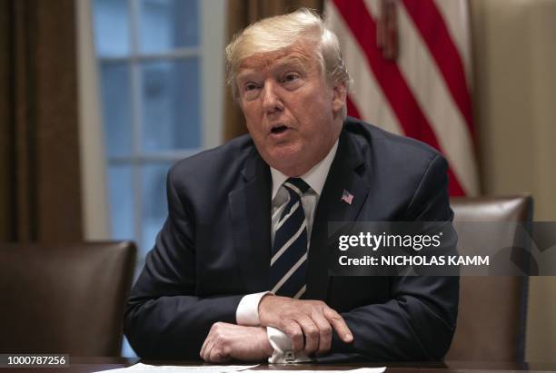 President Donald Trump speaks about his meeting with Russian President Vladimir Putin ahead of a meeting with Republican lawmakers and cabinet...