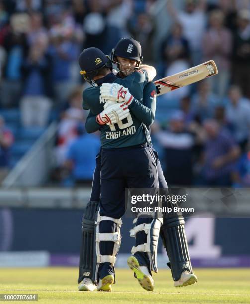 Joe Root and Eoin Morgan of England celebrate hthe win in the 3rd Royal London One-Day International between England and India at Headingley on July...