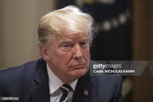 President Donald Trump speaks about his meeting with Russian President Vladimir Putin ahead of a meeting with Republican lawmakers and cabinet...
