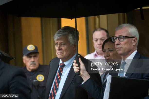 Dean Skelos, a former Republican politician and the former Majority Leader of the New York State Senate, exits federal court, July 17, 2018 in New...