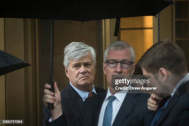 Dean Skelos, a former Republican politician and the former Majority Leader of the New York State Senate, exits federal court, July 17, 2018 in New...