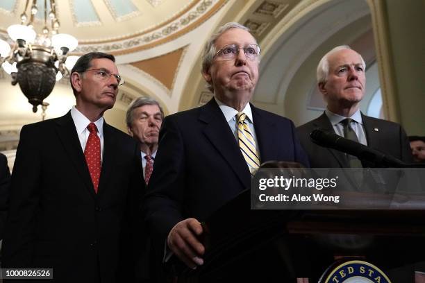 Senate Majority Leader Sen. Mitch McConnell speaks as Sen. John Barrasso , Sen. Roy Blunt and Senate Majority Whip Sen. John Cornyn listen during a...