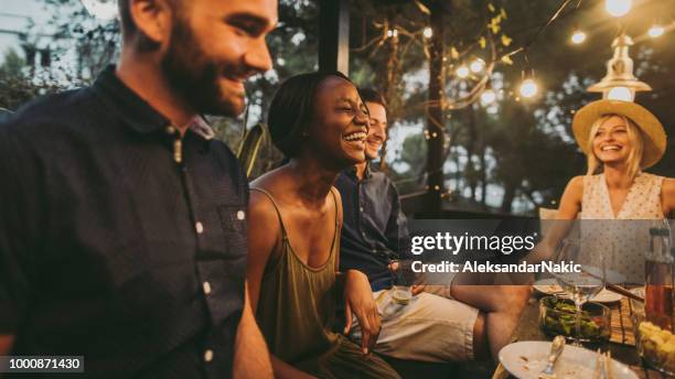 summer dinner party - outdoor restaurant stock pictures, royalty-free photos & images