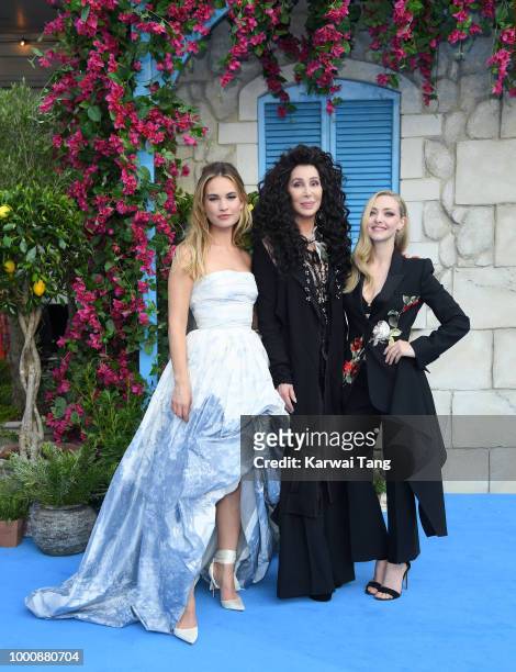 Lily James, Cher and Amanda Seyfried attend the World Premiere of "Mamma Mia! Here We Go Again" at Eventim Apollo on July 16, 2018 in London, England.