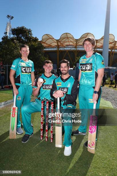 Brisbane Heat WBBL and BBL players Jess Jonassen, Matthew Renshaw, Ben Cutting and Sammy-Jo JohnsonÊposeÊduring the Big Bash League Fixture...